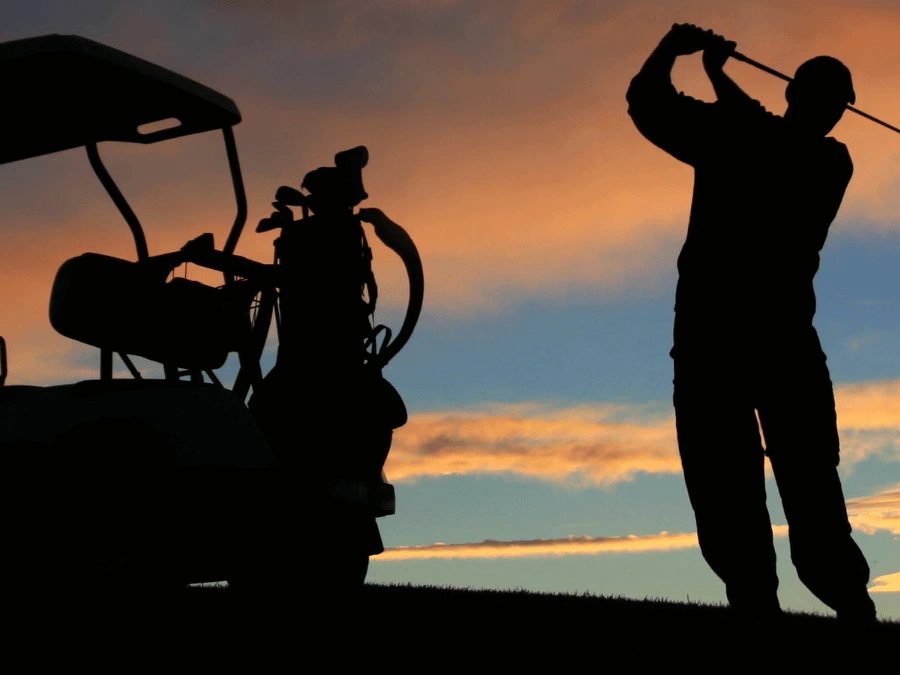 sunset-golfer-golfcart